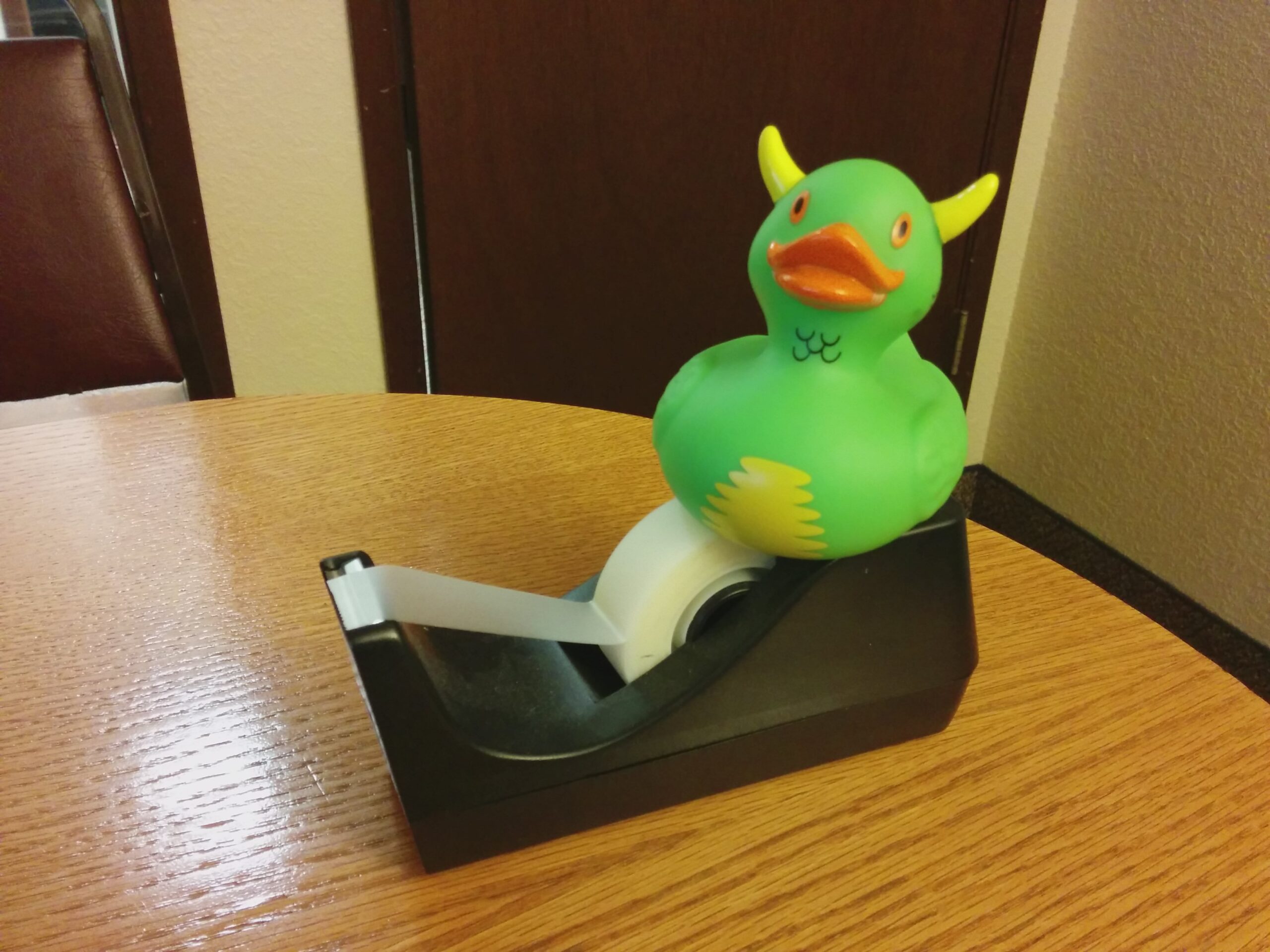 Rex on a Tape Dispenser