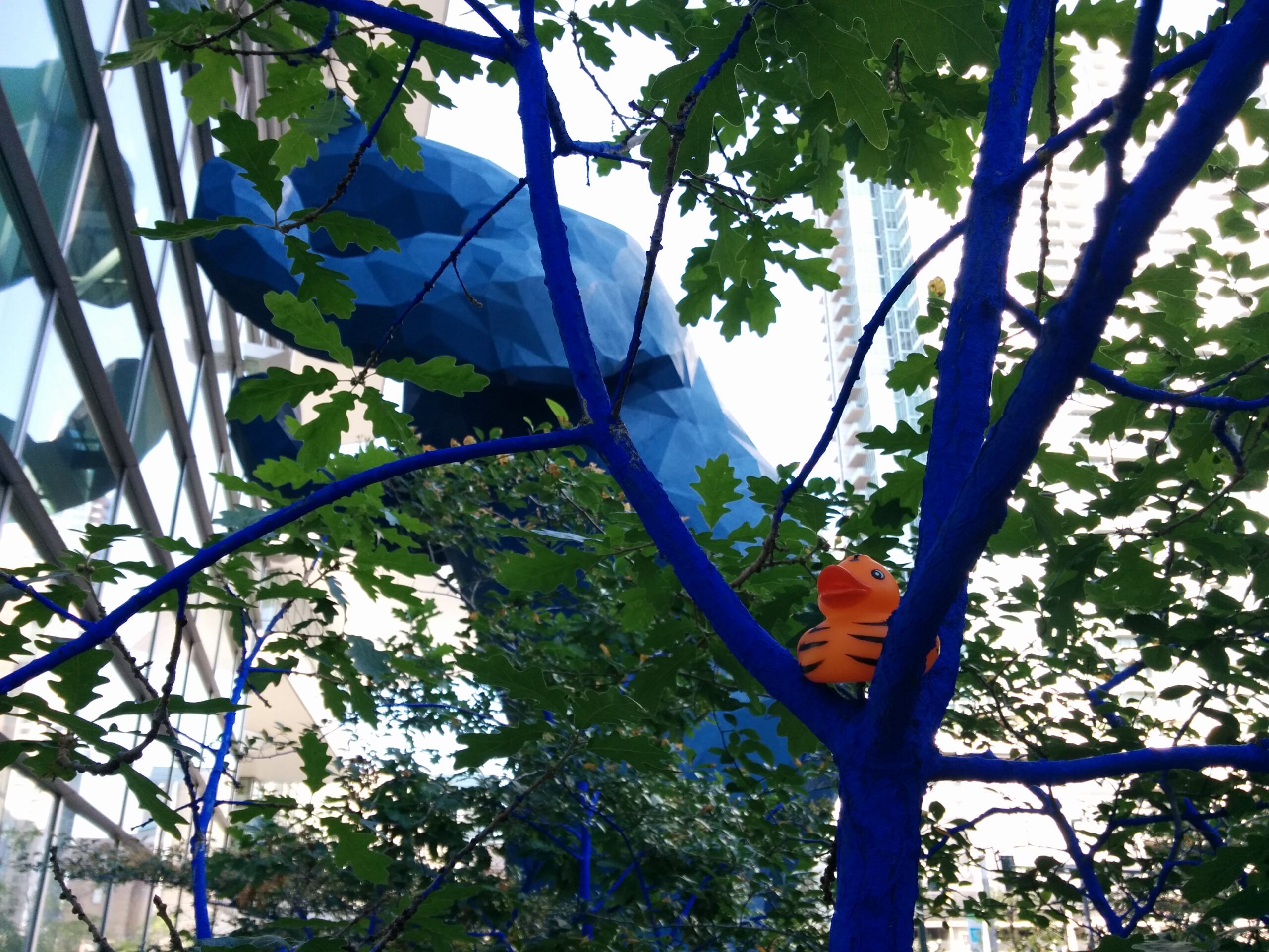 Tiger on a Blue Tree