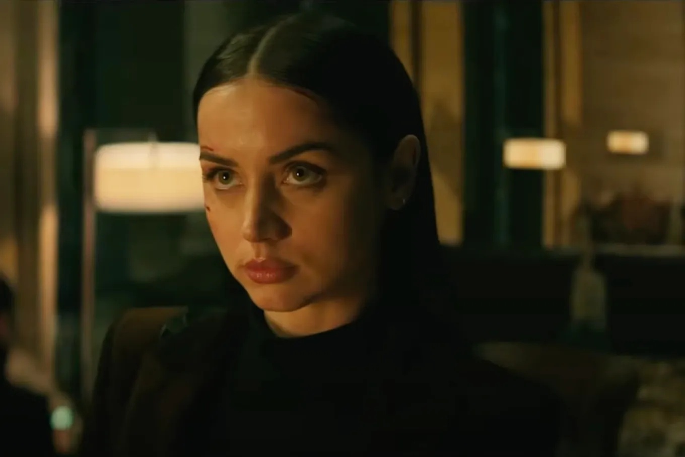 Still image from the film "Ballerina" of the main character Eve, played by Ana de Armas.