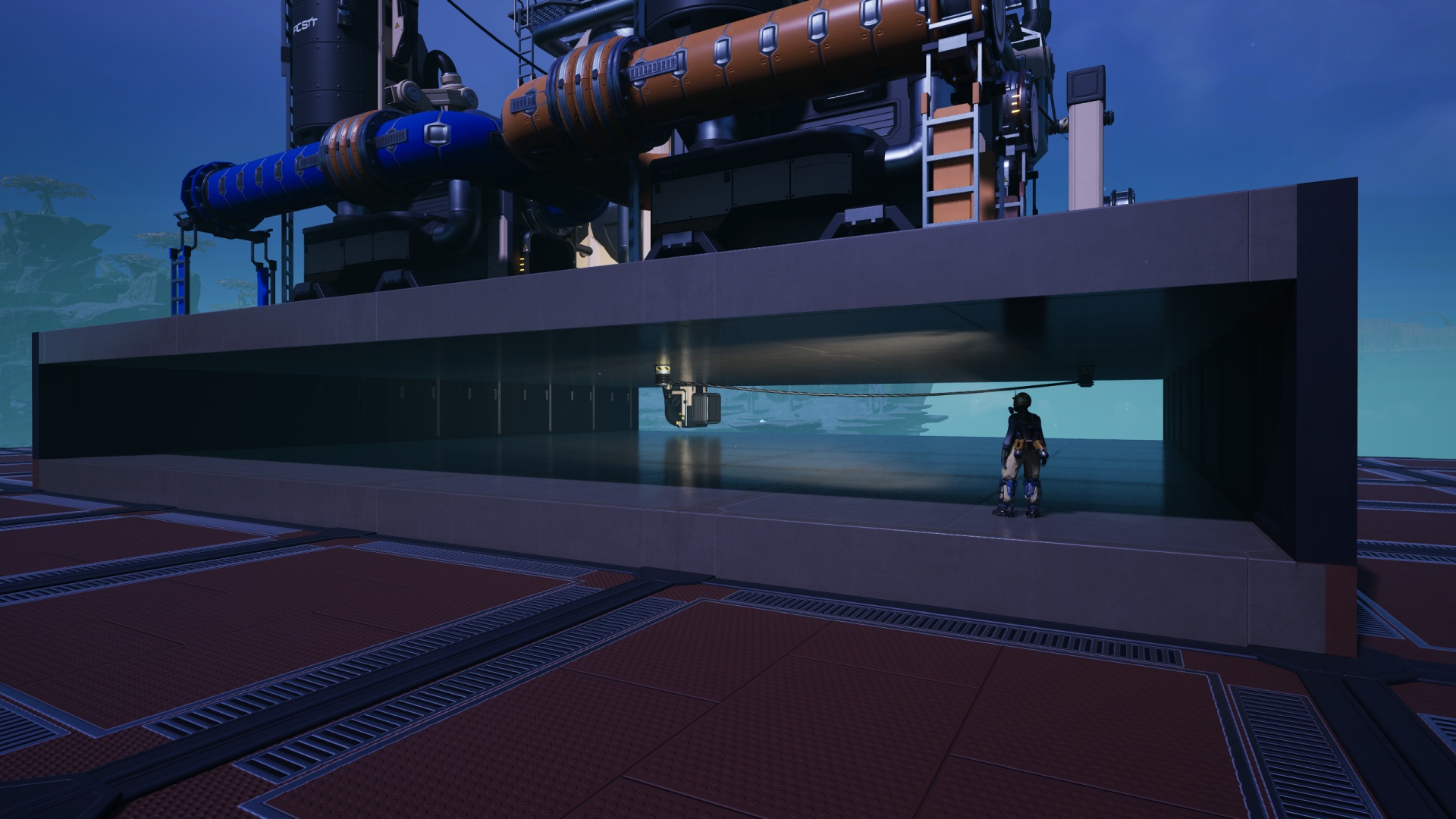 Satisfactory video game screenshot: The Pioneer stands in the underfloor space of a blueprinted machinery rig, shining a headlamp onto a conveyor lift piece poking down into that space from a refinery above.